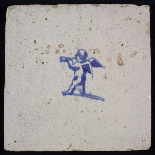 White tile with blue putto, wall tile tile sculpture ceramic earthenware glaze, baked 2x glazed painted