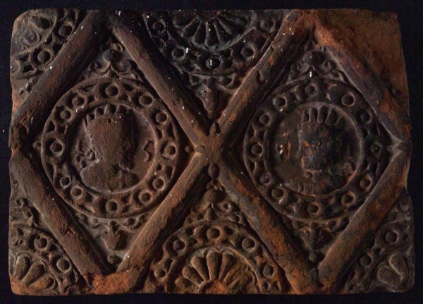Hearthstone, from Antwerp Belgium, without frame, with male and female head, fireplace stone part ceramic brick, baked Hearth