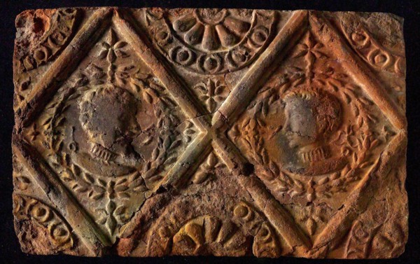 Hearthstone, from Antwerp Belgium, without frame, with male and female head, fireplace stone part ceramic brick, fried Hearth