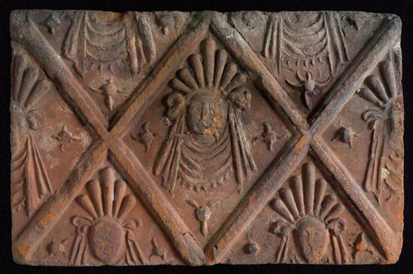 Hearthstone, from Antwerp Belgium, without frame, with mascaron on the window, hearth fireplace component ceramics brick, baked