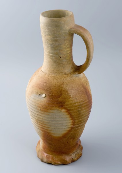 High stoneware jug, gray glazed with brown spots, on squeeze foot, jug crockery holder soil find ceramic stoneware glaze salt