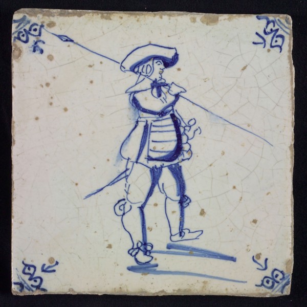 White tile with blue warrior; corner pattern ox head, wall tile tile sculpture ceramic earthenware glaze, baked 2x glazed