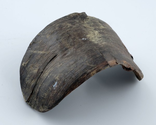 Wooden bottom of small tub or basket, oval in shape, component ground find timber, sawn planed stabbed Oval wooden bottom