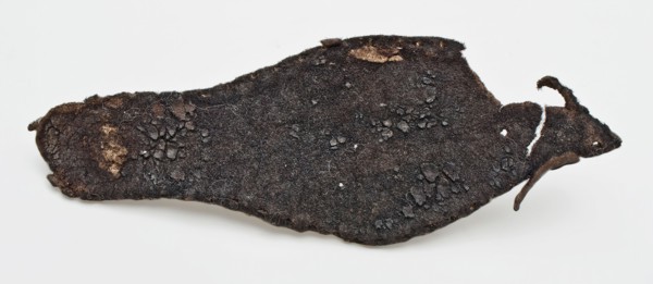 Sole of pointy leather children's shoe with stitching along edges, sole shoe footwear children's clothing part of the baseline