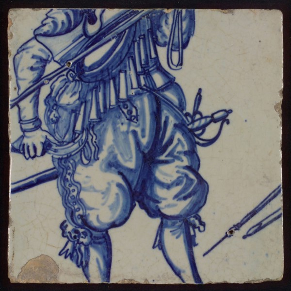 Tile of tableau with in blue torso of soldier, tile picture footage fragment ceramics pottery glaze, baked 2x glazed painted