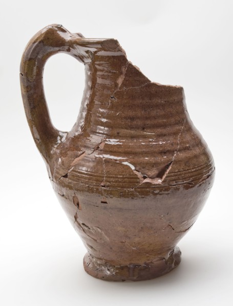 Pottery jug, completely brown glazed with high band ear, on stand, water jug crockery holder soil find ceramic earthenware glaze