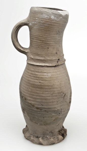 Gray stoneware jug on pinched foot, jug be found at the bottom of the ceramic stoneware, hand-turned baked Stoneware jug flat
