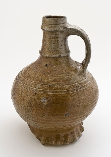 Light brown stoneware jug on pinched foot, pronounced ring around neck and under lip, jug crockery holder soil find ceramic