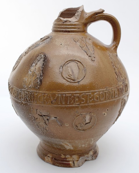 Stoneware jug, round belly frieze with text above and below portrait medallions and leaf motif, jug crockery holder soil find