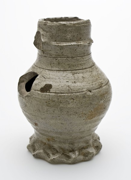 Gray stoneware jug with pinched foot, three deep lines on belly and shoulder, jug crockery holder soil find ceramic stoneware