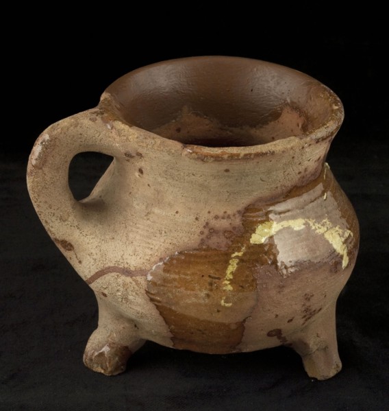 Pottery cooking jug, grape model, decorated in sludge technology, on three outstanding legs, grape cooking pot tableware holder