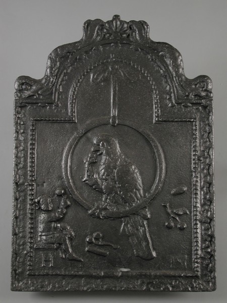 Fireback parrot in ring with child, text H M, fire place h 65.0, living environment interior heating