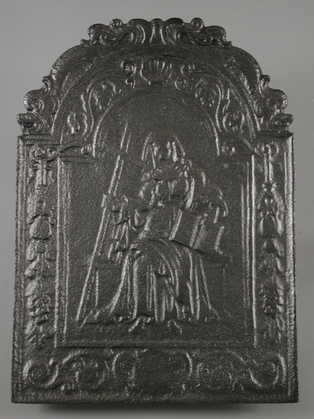 Fireback woman with cross and book, Fides, hob plate cast iron, cast Rectangular bow at the top on which two dolphins.