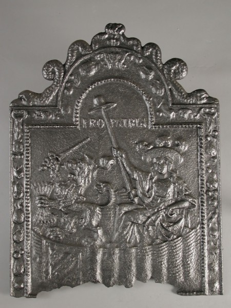 Fireback Dutch virgin in garden, text Pro Patria, hob plate cast iron, cast Rectangular bow at the top on which dolphins