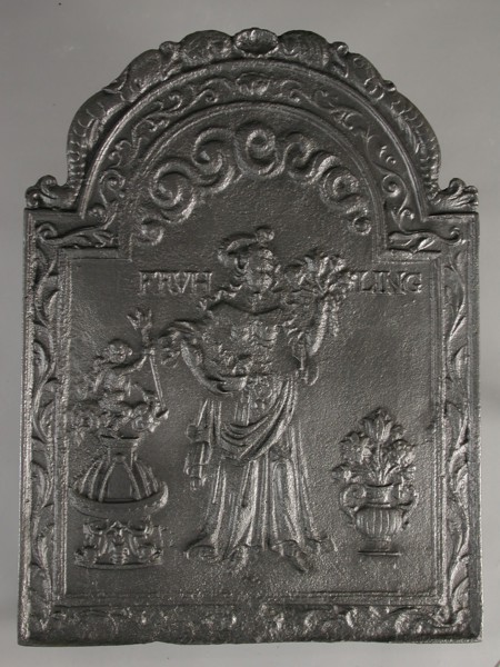 Fireplace Spring, text Frühling, fire place iron, cast Rectangular with arch at the top. On top of shell flanked by dolphins