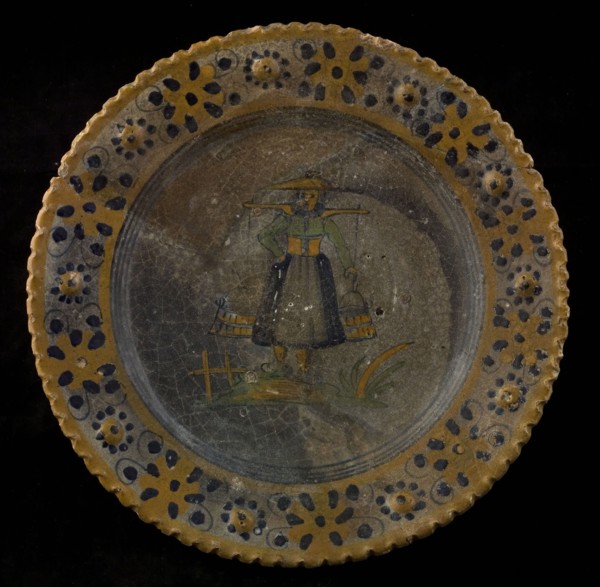Majolica dish with polychrome border and image of woman with yoke and buckets, dish plate crockery holder earth discovery
