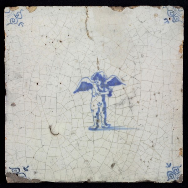 White tile with blue putto; corner pattern ox head, wall tile tile sculpture ceramic earthenware glaze, baked 2x glazed painted