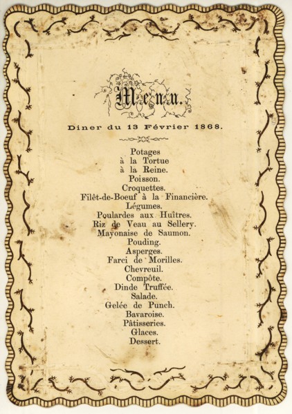 Menu card with scalloped edge, decorated with gold-colored ornaments and with printed French text, menu card information form