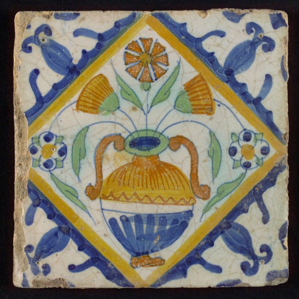 Tile, orange, brown, green and blue on white, flowerpot in square, corner pattern palmet, wall tile tile sculpture ceramic
