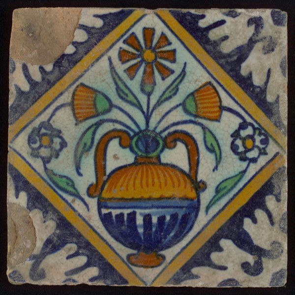 Tile, orange, brown, green, and blue on white, flowerpot in square, corner pattern palmet, wall tile tile sculpture ceramic