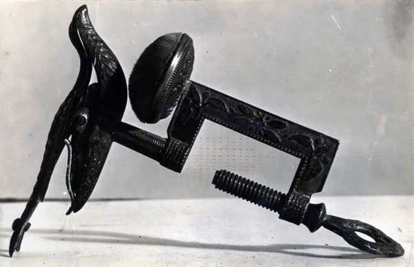 Sewing Bird, c. 1853, United States, Brass-colored, with bird-shaped clamp and floral design on