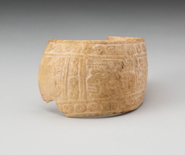 Shell, Possibly an Arm Band, Incised with Profile Head Framed by Geometric Motifs (Frament), c. A.D