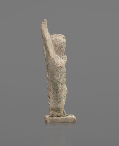 Terracotta figurine of Psyche. Young Psyche with butterfly wings, wrapped in a chlamys. Right hand