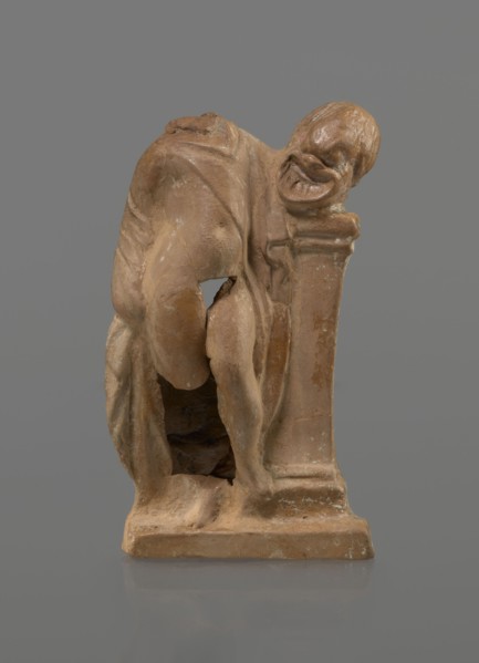 Terracotta figurine of a youth with a terracotta mask; creator, ca. 332–30 BC, Hellenistic period
