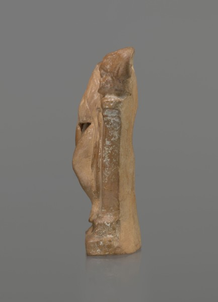 Terracotta figurine of a youth with a terracotta mask, Hellenistic period 4th–1st century BC, ca.