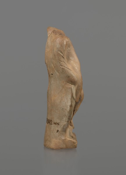 Terracotta figurine of a youth with a terracotta mask, Hellenistic period 4th–1st century BC, ca.