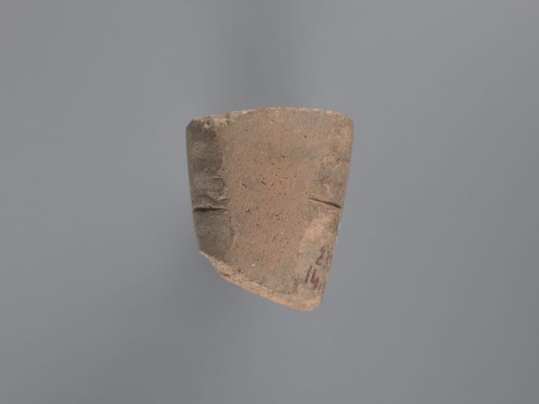 Seal, unknown South Egyptian workshop; pyramidal clay seal with a roughly square stamp surface,