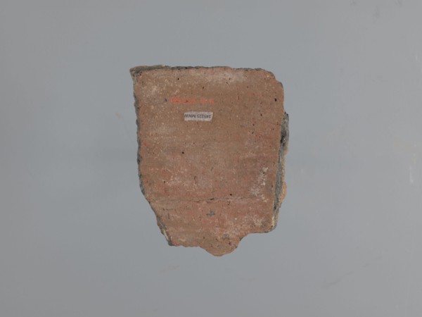 Fragment of a utility vessel. Made of type C Nile clay, highly porous with organic admixtures chaff
