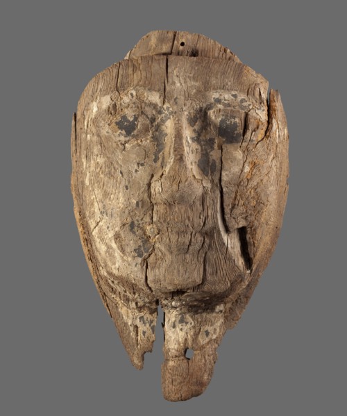 Sarcophagus mask with a preserved fragment of the neck and a protrusion above the forehead an