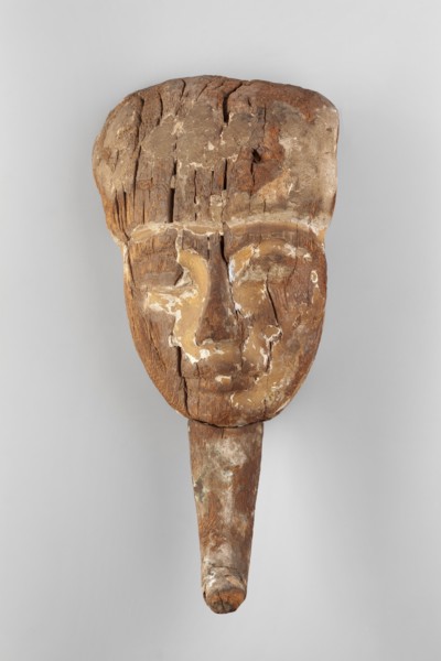 Sarcophagus mask. Sarcophagus mask with a preserved face, the middle part of a wig, and a false