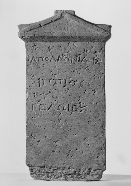 Tombstone of Apollonides with Greek inscription. Rectangular slab with three lines of Greek