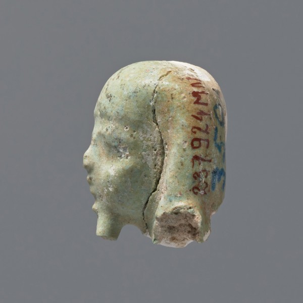 Fragment of a shabti. Head of a shabti figurine with rather carelessly rendered facial features, in