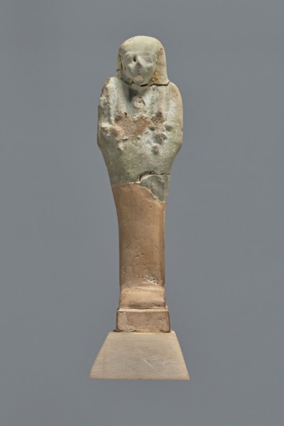 Fragment of a shabti, Mummy-shaped funerary figurine shabti, grave good, upper part preserved to