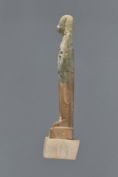 Fragment of a shabti. Mummy-shaped figurine, grave good, preserved to the beginning of the thighs.