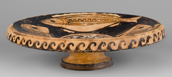 Red-figure plate depicting fish; plate with an inwardly curled edge. Interior painted with four