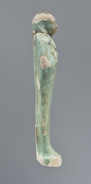 Shabti, mummy-shaped figurine, funerary gift, hoes; standing on a base, back supported by a