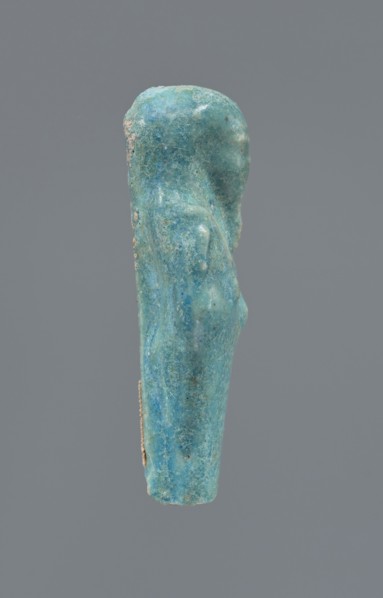 Shabti, Mummy-shaped figurine, funerary gift; supported at the back on a pillar. Legs missing from