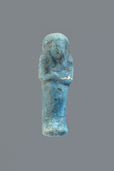 Ushabti, Mummy-shaped figurine impressed in a mold, carelessly made of faience; back flat and