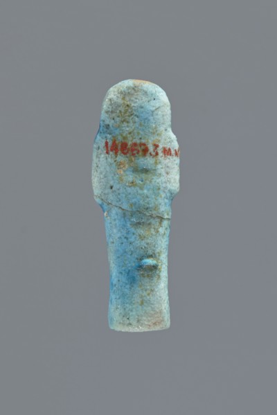 Ushabti, Mummy-shaped figurine, impressed in a mold, carelessly made of faience; back flat and