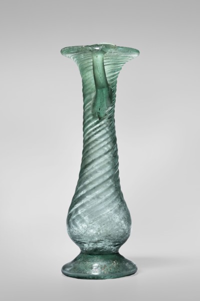 Unguentarium, unknown Eastern workshop. Glass vessel, transparent light green, Barag type VII: 1,