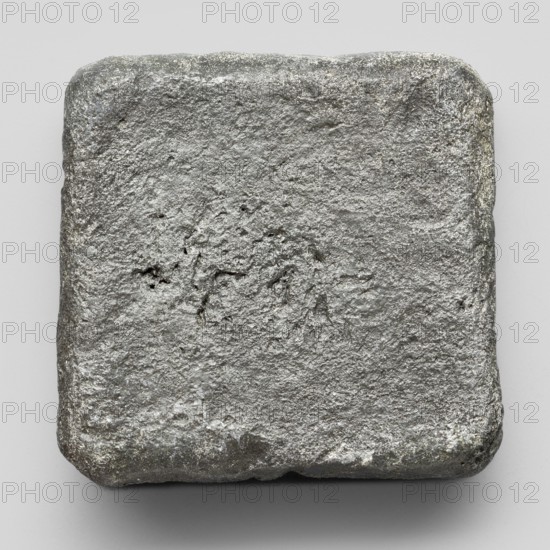 Lead weight, Greek letters in the corners EMIT; Athens, Attica; 4th–2nd century BC; weight; height