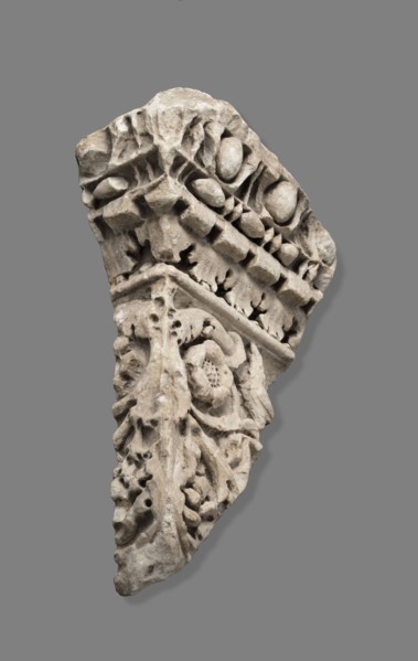 Fragment of architectural decoration. Corner section of a fragment made in relief. The cornice is