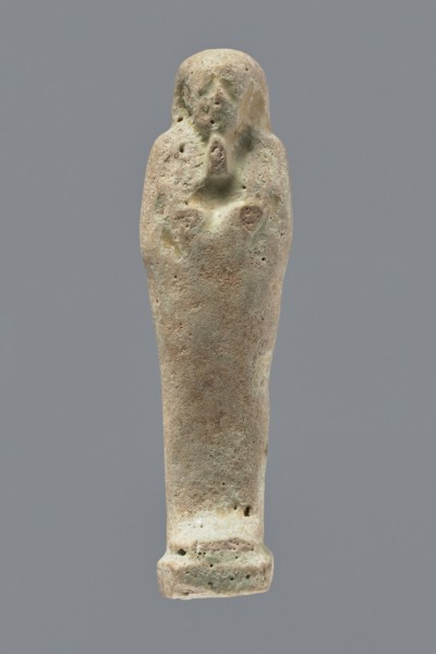 Ushabti, mummy-shaped figurine, funerary gift, hoes. Mummy-shaped figurine standing on a base, back