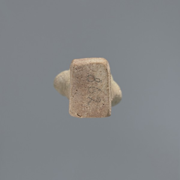 Ushabti, Mummy-shaped figurine, standing on a base, the back supported by a flat pillar. The arms