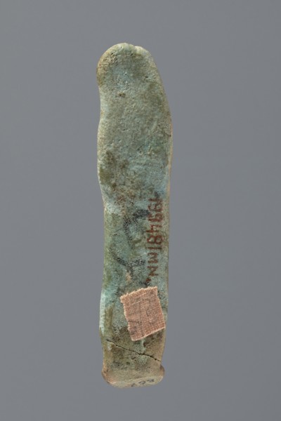 Ushabti, Mummy-shaped figurine, very schematically shaped. Hands crossed on the chest. On the head