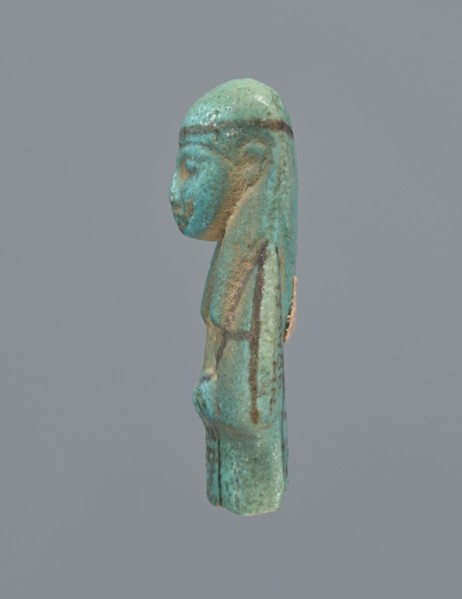 Ushabti, mummy-shaped figurine, preserved upper fragment from the waist up. Arms crossed on the